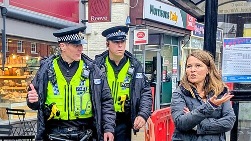 Vikki Walking round Wimborne with two police officers