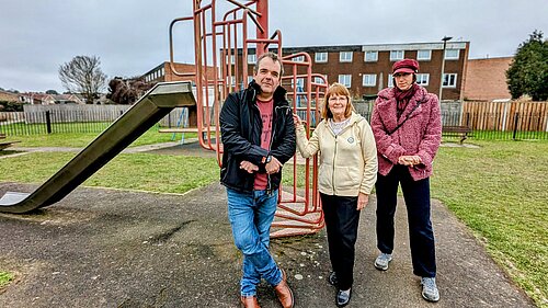 The Canford Heath councillor trio stood in a play park