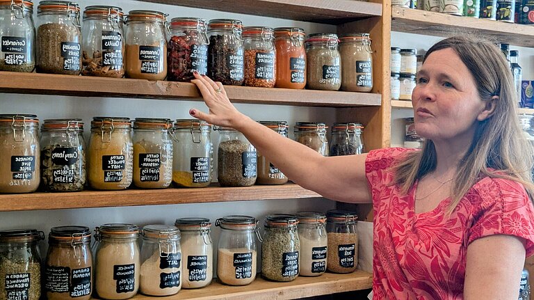 Vikki Slade looks at shelves of a local Wareham shop