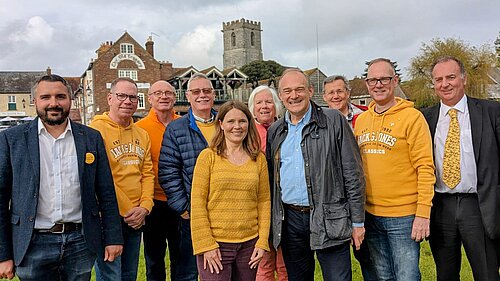 Vikki Slade and Ed Davey stood with Dorset councillors